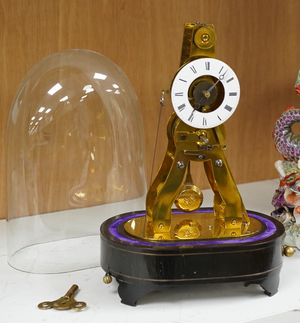 A late 19th century French eight day skeleton timepiece with alarm under glass dome, stamped 'Ms Honorables Exp. Paris Londres' with key